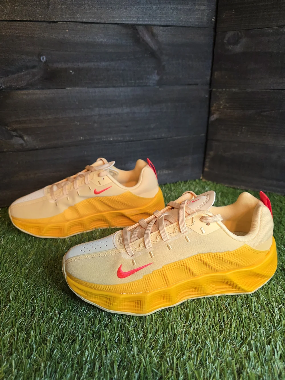 Nike Peach and Yellow Low-Top Sneakers with Pink Swoosh